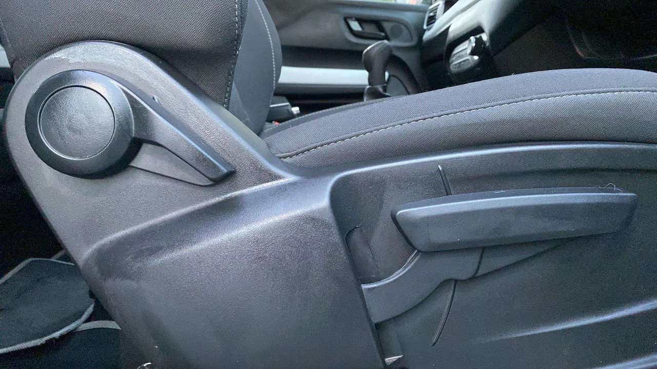 Front seat adjustment lever of a Tata Punch