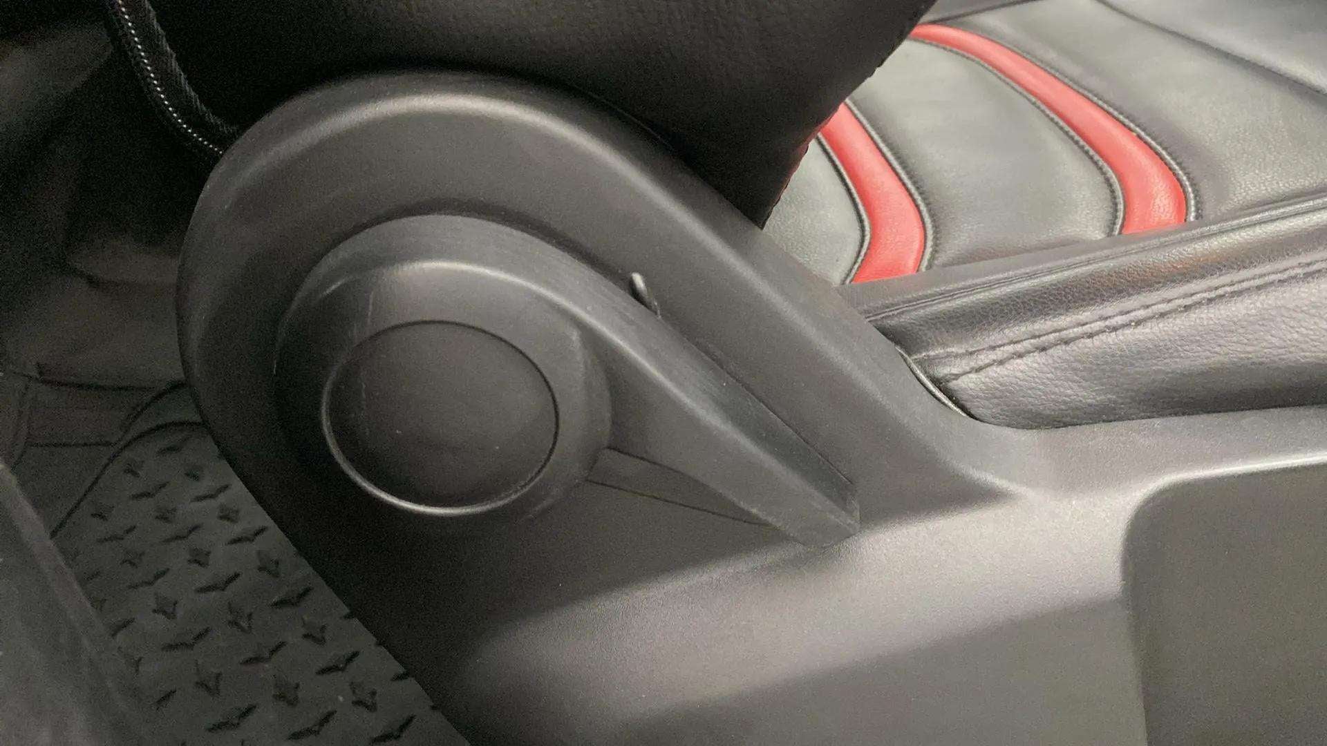 Seat adjustment knob and leather seat of a Tata Punch