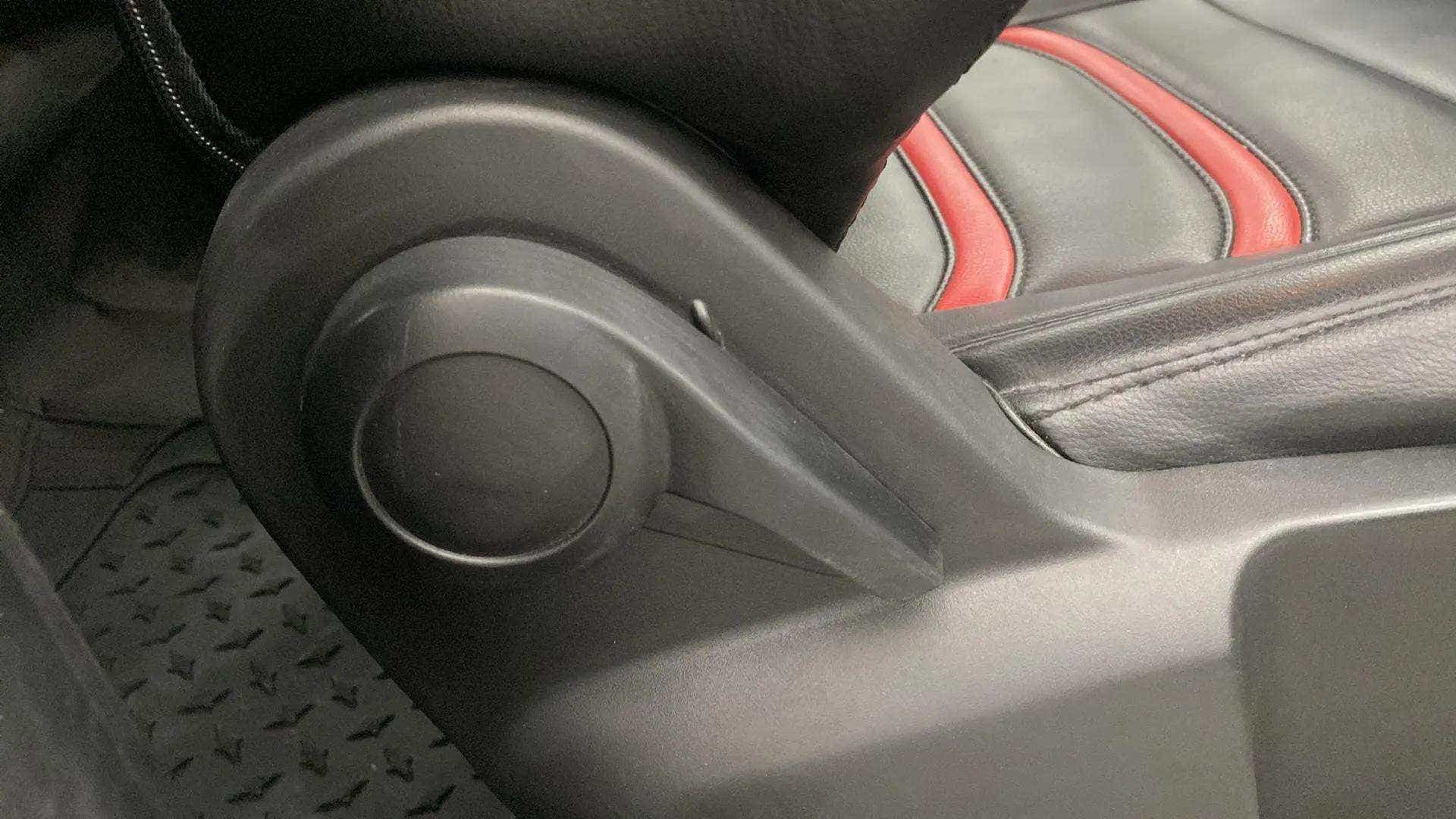 Seat adjustment knob and leather seat of a Tata Punch