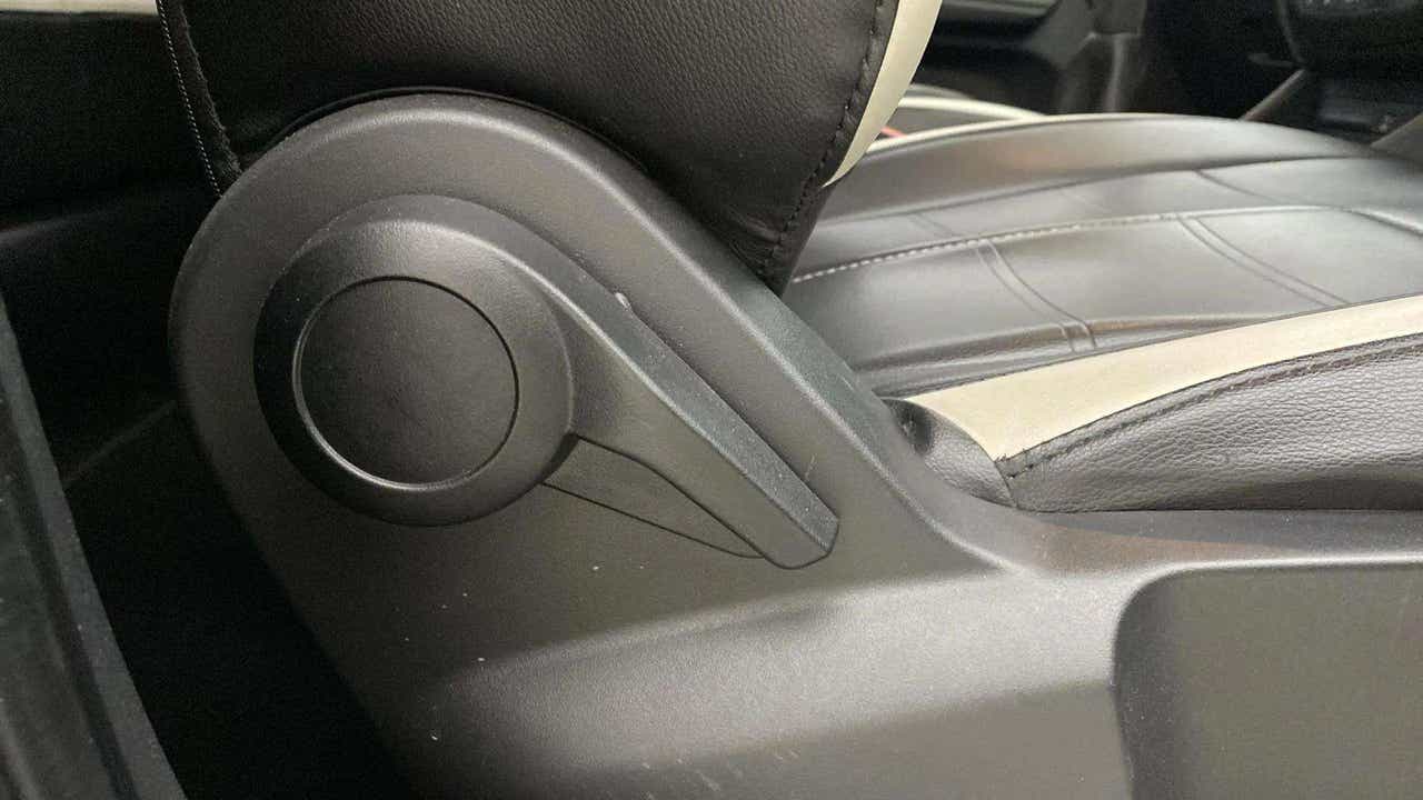 Close-up of a seat adjustment lever of a Tata Punch