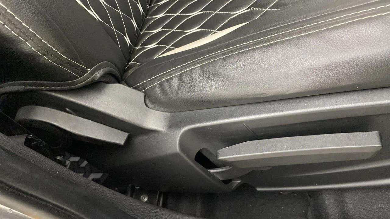 Close-up of seat adjustment lever in a Tata Punch
