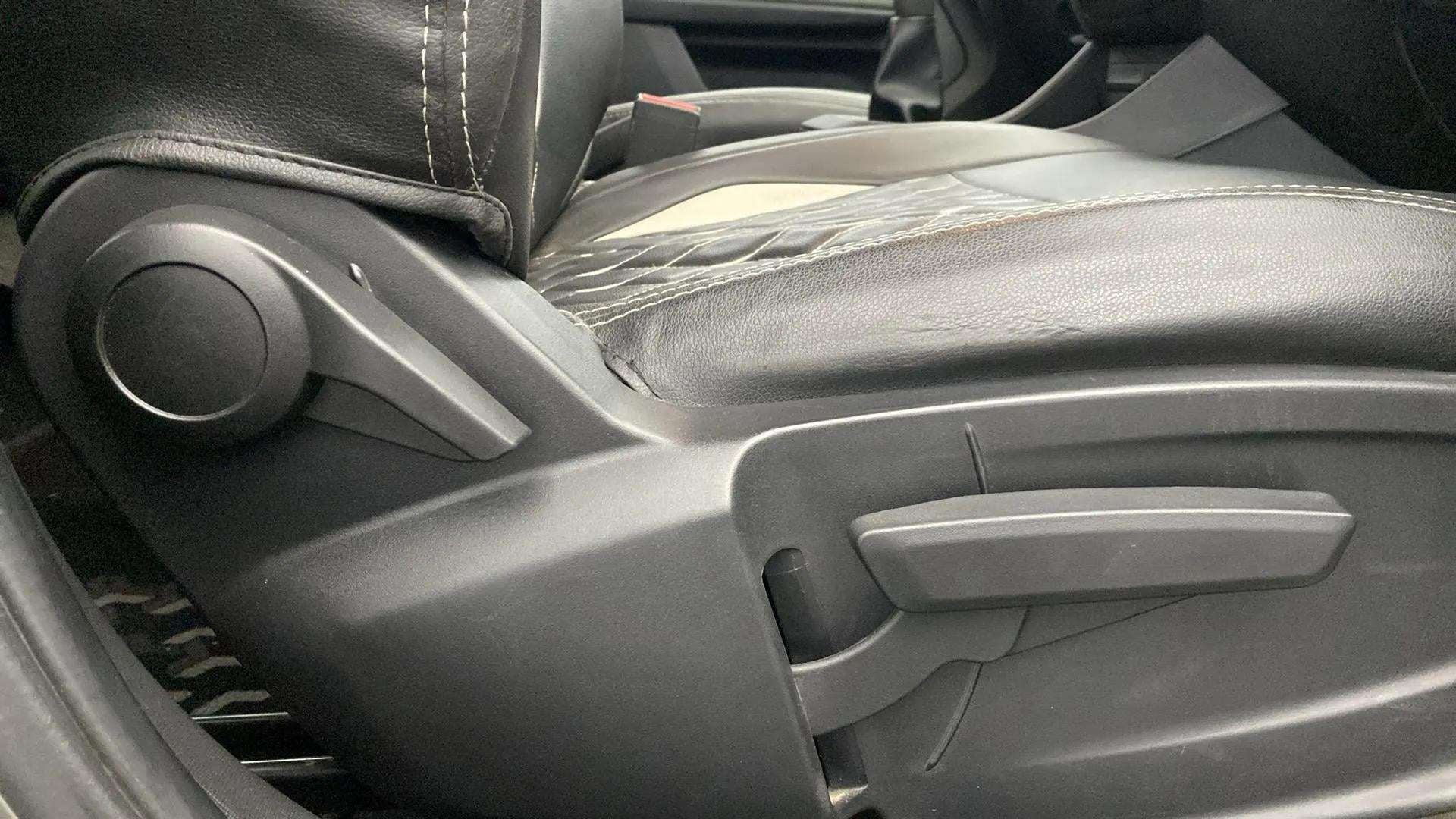 Close-up view of the seat adjustment controls of a Tata Punch