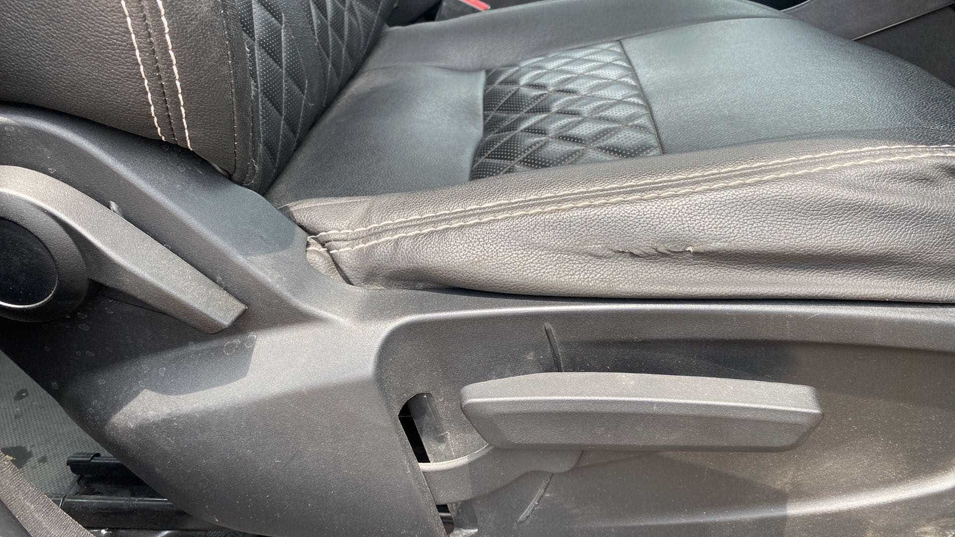 Close-up of car seat adjustment controls on a Tata Punch