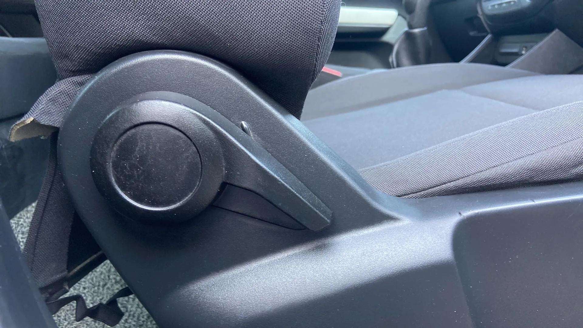 Seat adjustment knob close-up of a Tata Punch