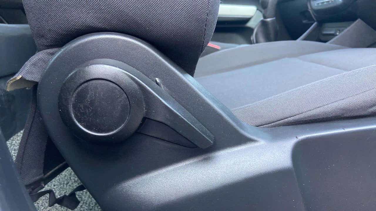 Seat adjustment knob close-up of a Tata Punch