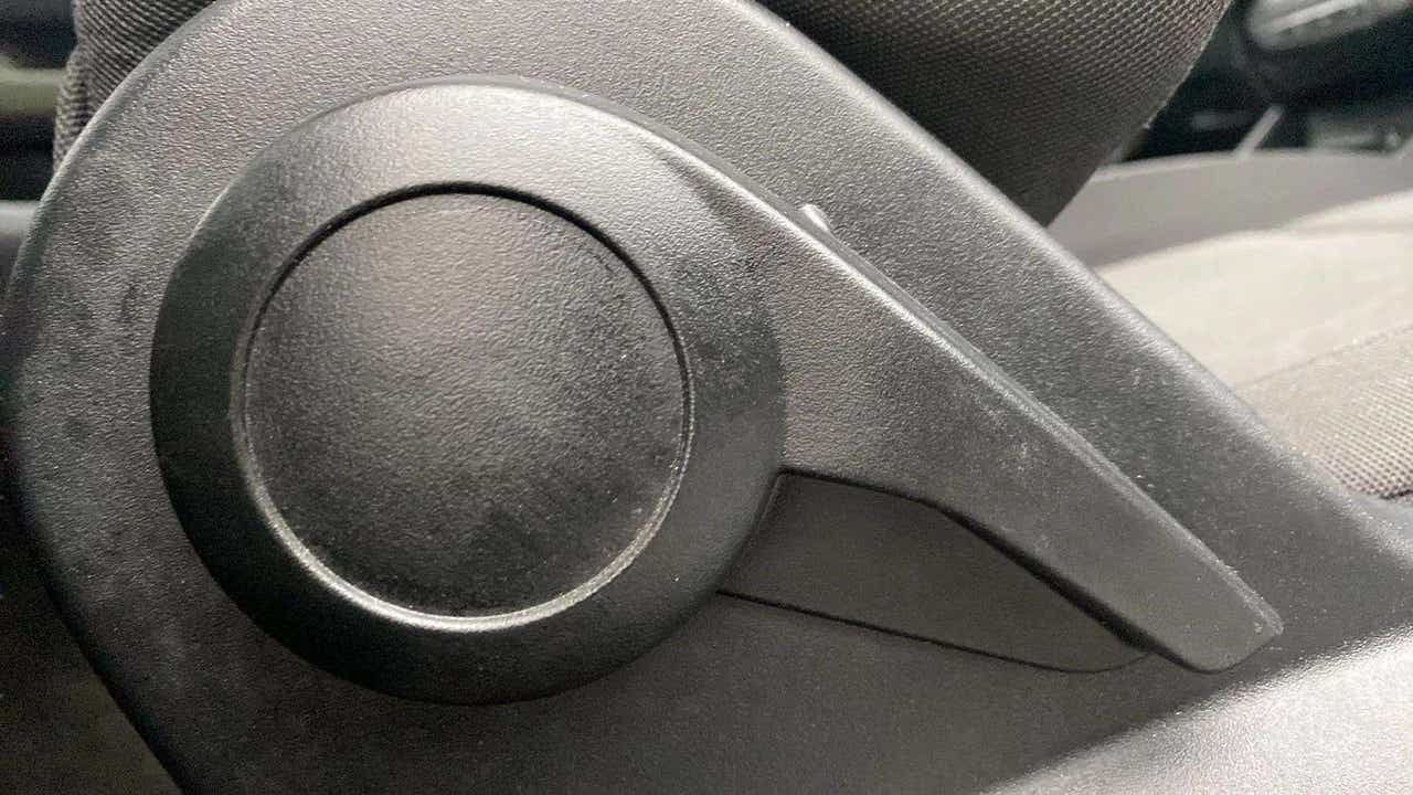 Seat adjustment knob of a Tata Punch