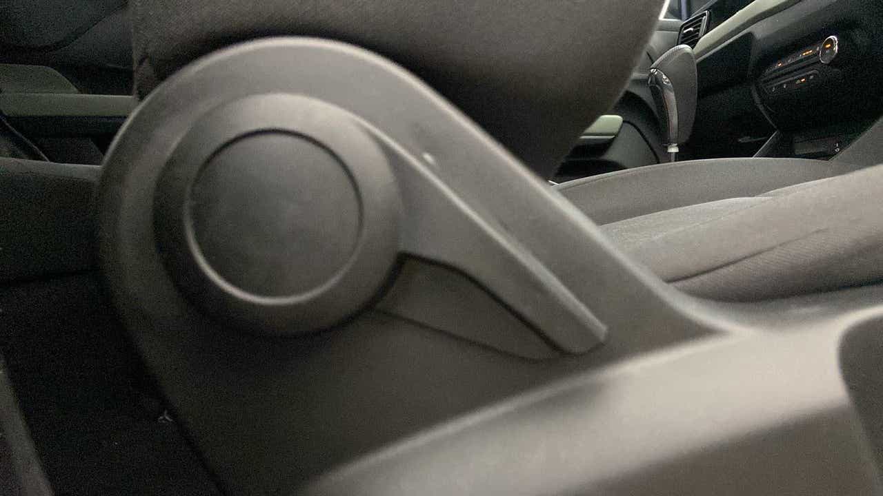 Seat adjustment knob and front interior of a Tata Punch