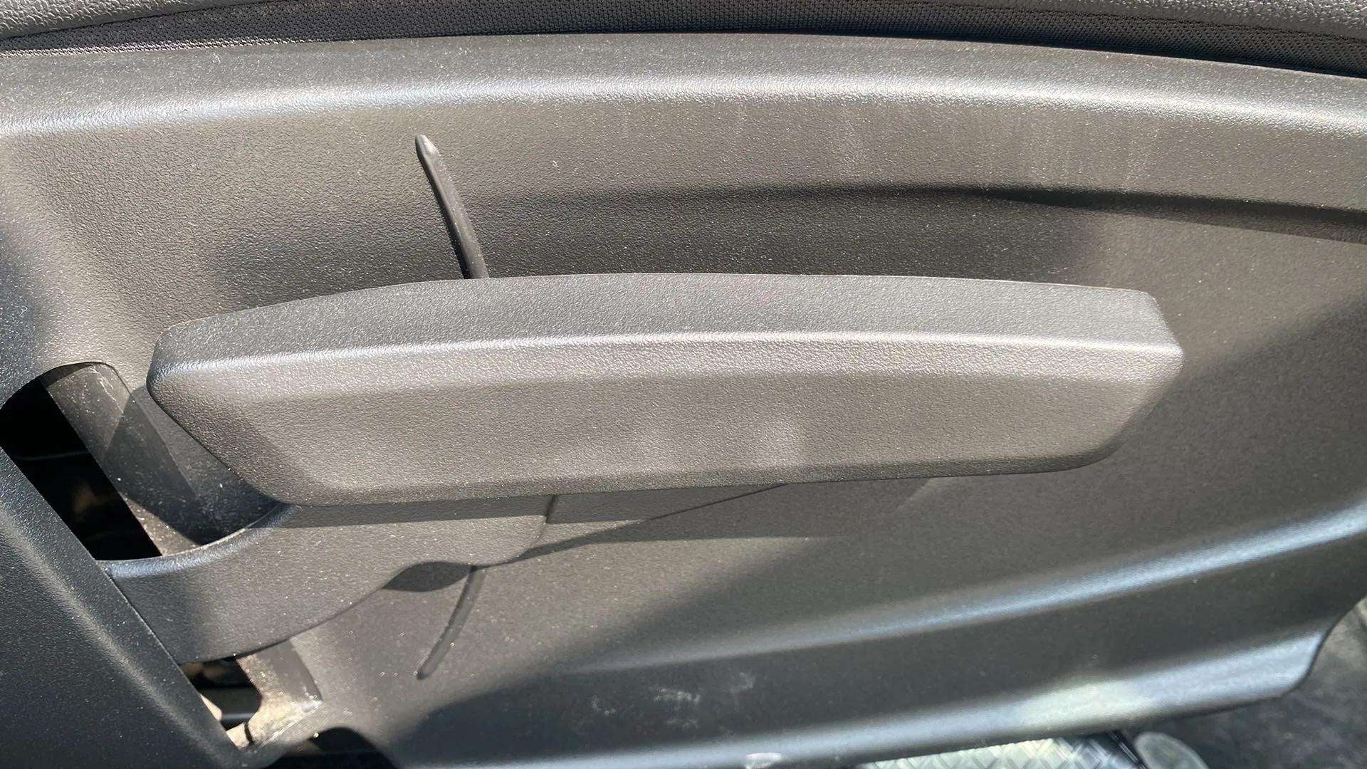 Close-up of the interior door handle of a Tata Punch