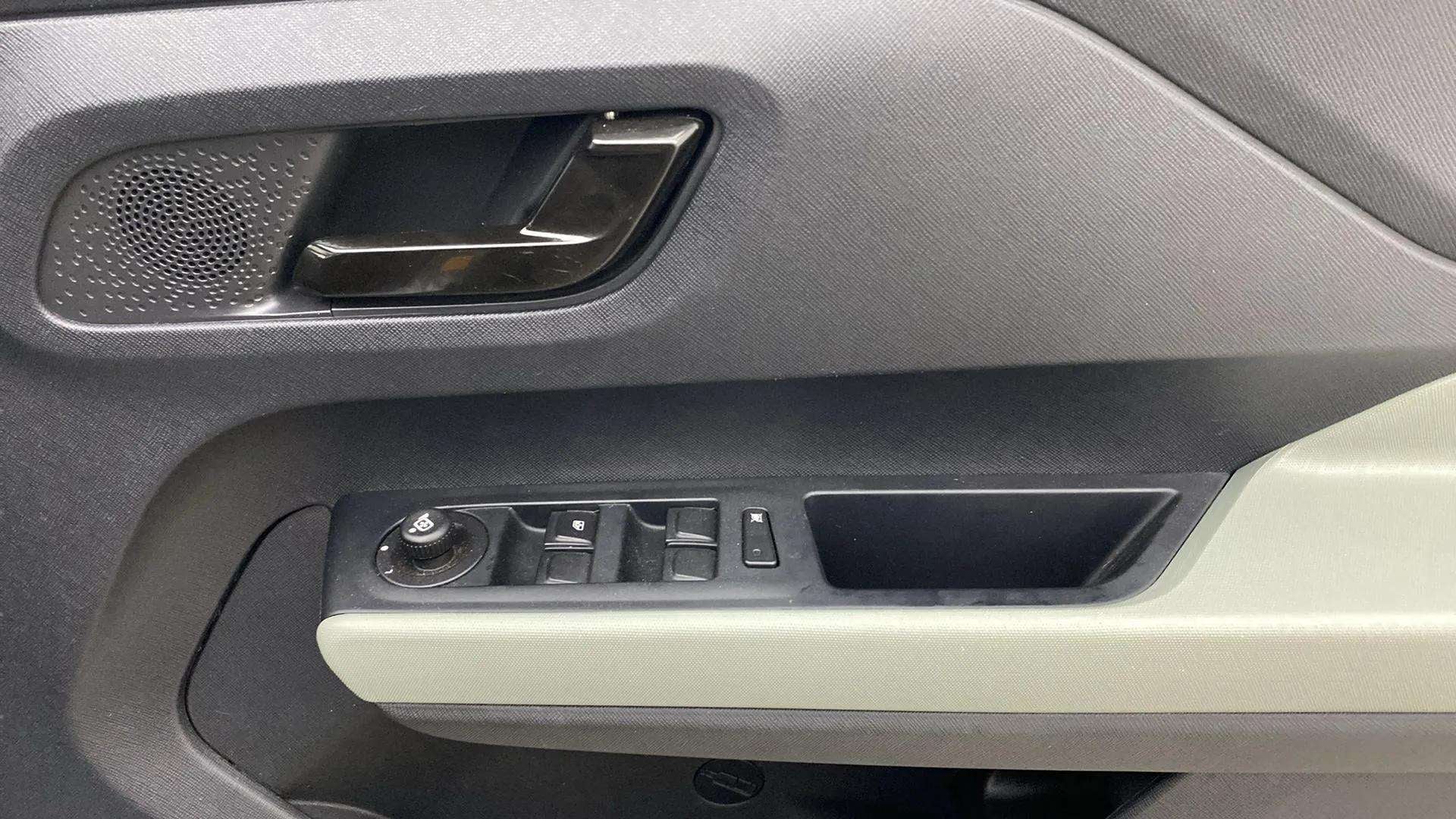 Front door controls and handle of a Tata Punch