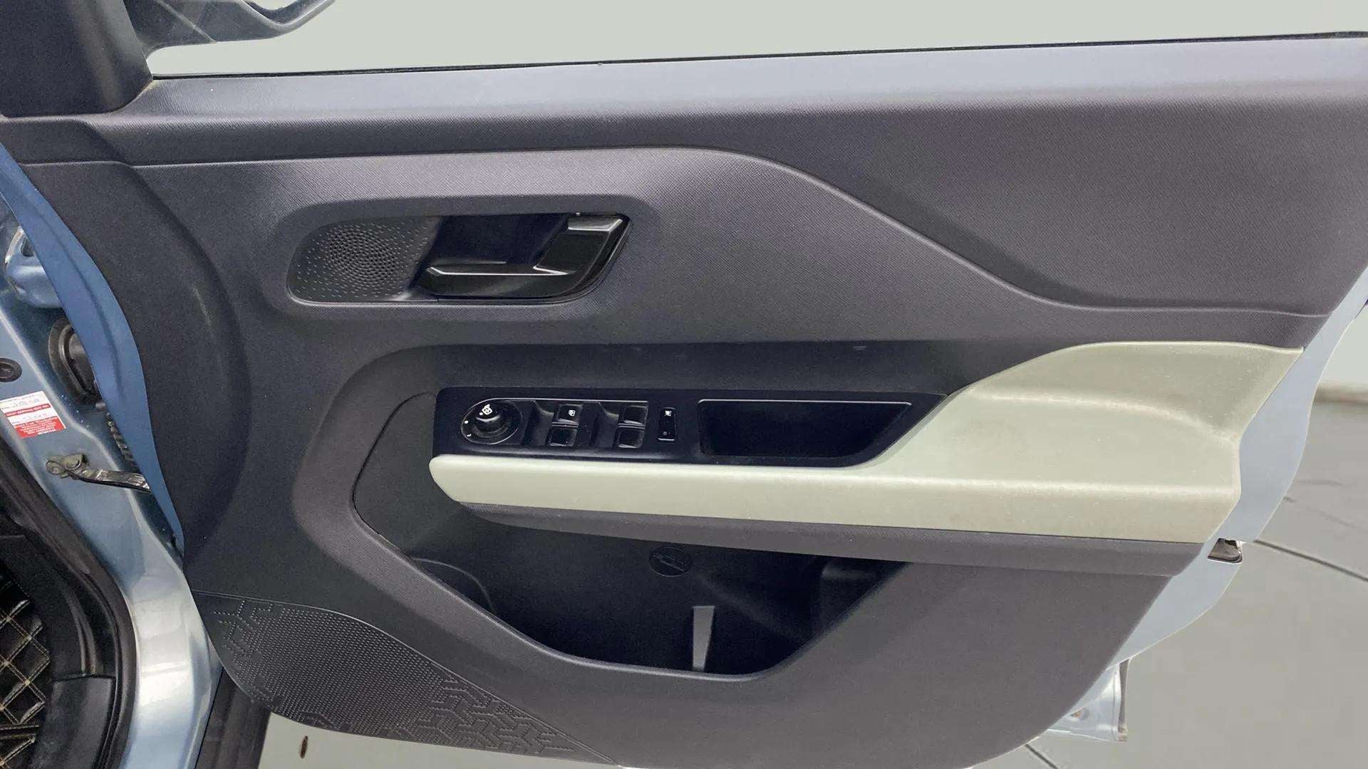 Driver side door panel of a Tata Punch