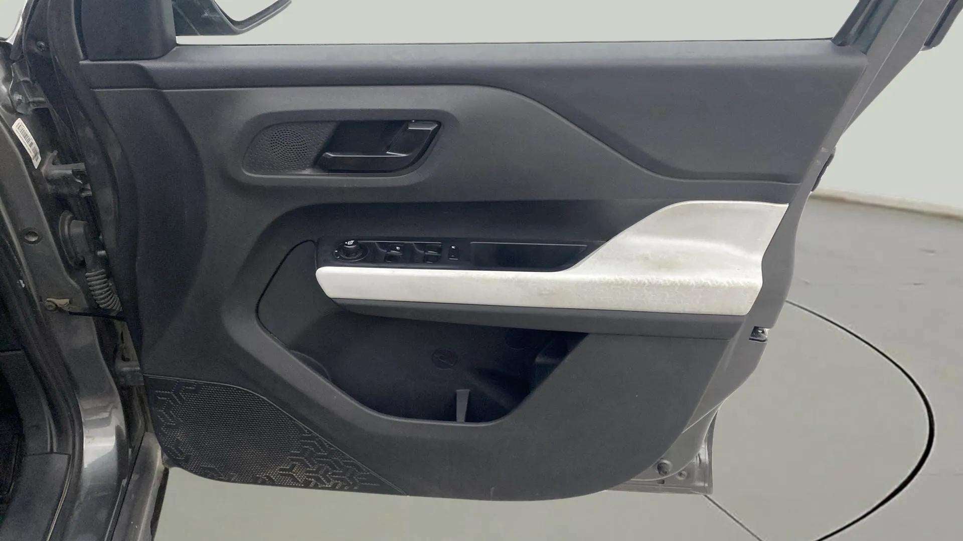 Interior driver side door panel of a Tata Punch