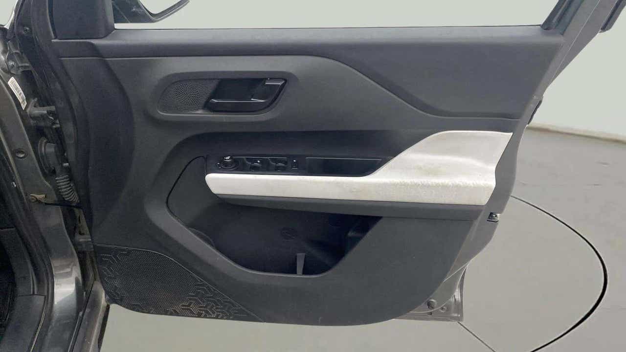 Interior driver side door panel of a Tata Punch