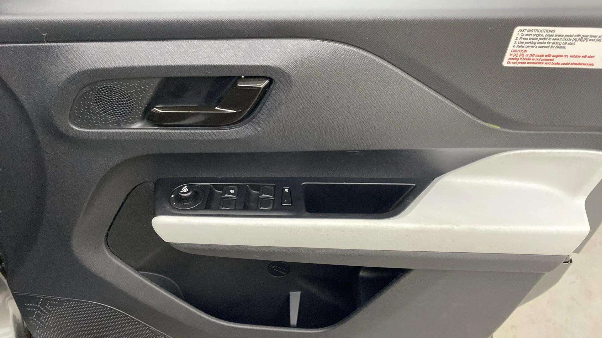 Front interior door panel of a Tata Punch