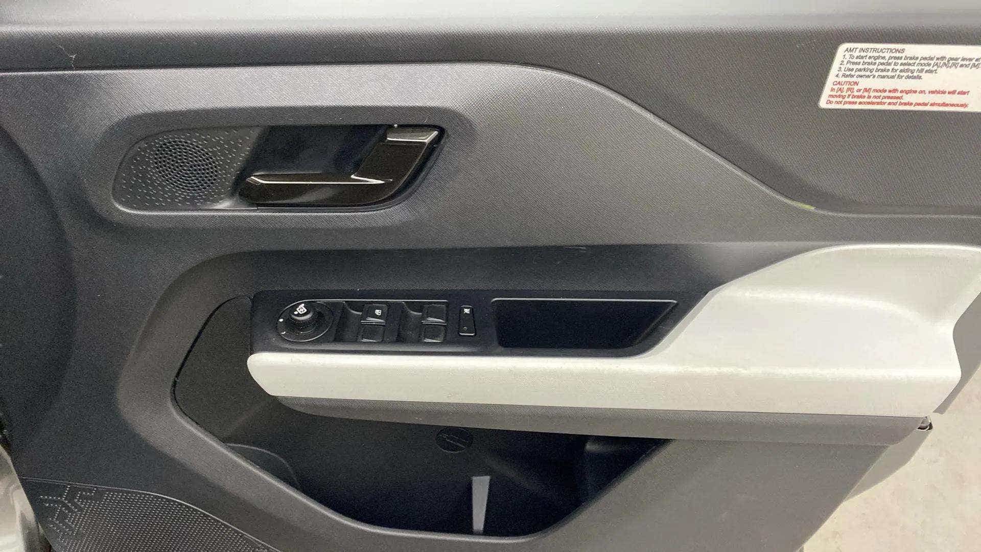 Front interior door panel of a Tata Punch