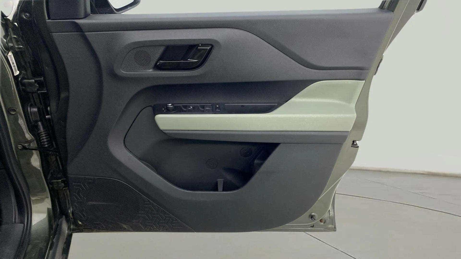 Interior driver side door panel of a Tata Punch