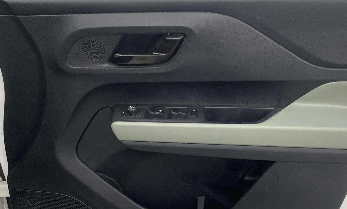 Driver side door panel interior of a Tata Punch