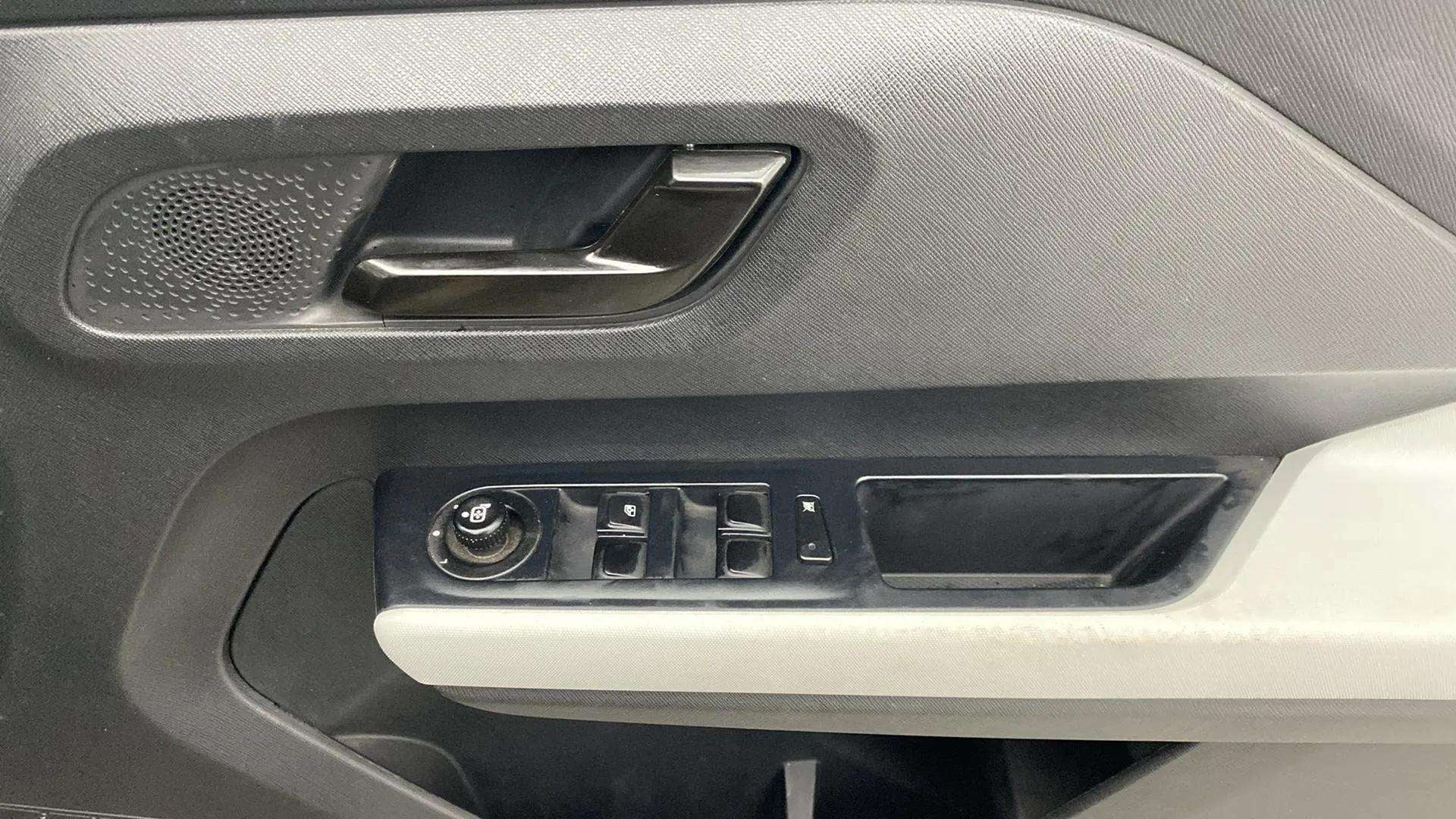 Interior door controls of a Tata Punch