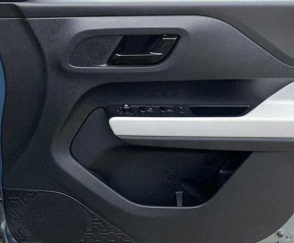 Interior door panel of a Tata Punch