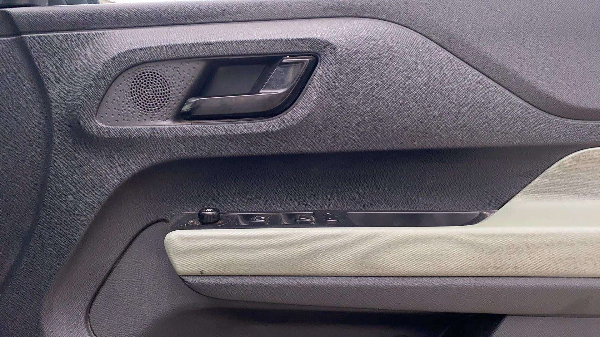Driver side door panel of a Tata Punch