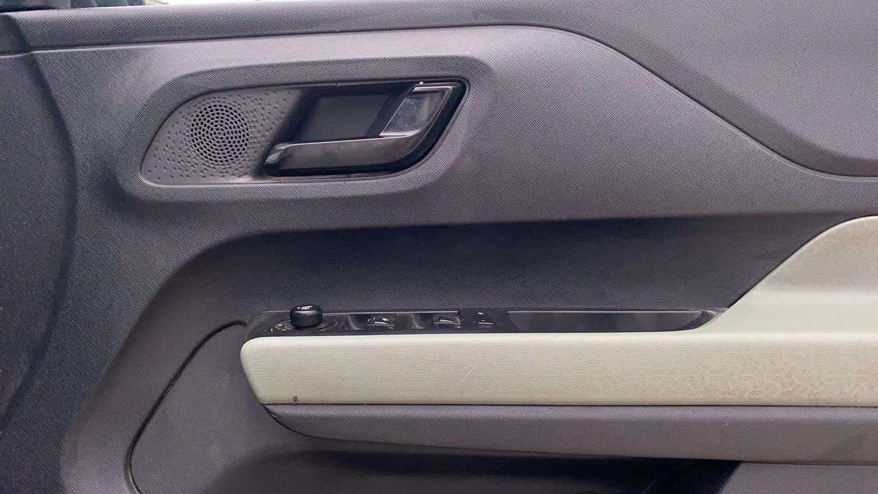 Driver side door panel of a Tata Punch