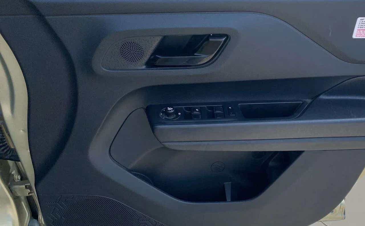 Front driver-side door panel of a Tata Punch