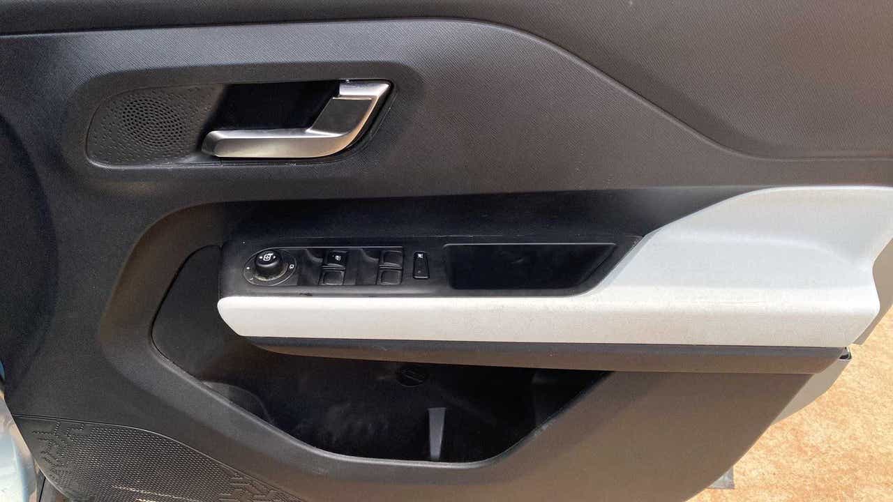 Interior front door panel of a Tata Punch