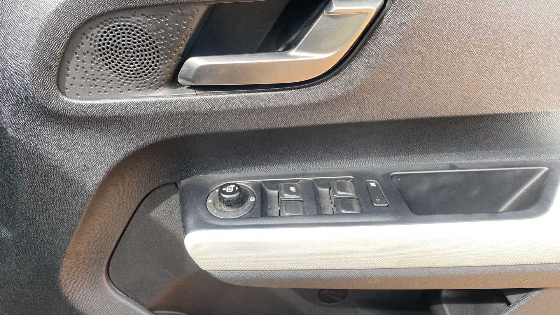 Driver side door controls of a Tata Punch