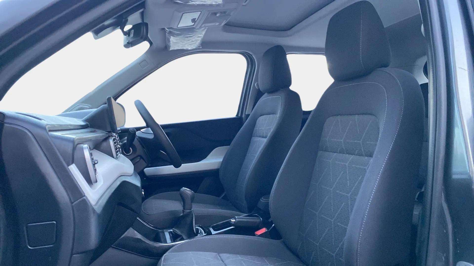 Front interior seats and dashboard of a Tata Punch