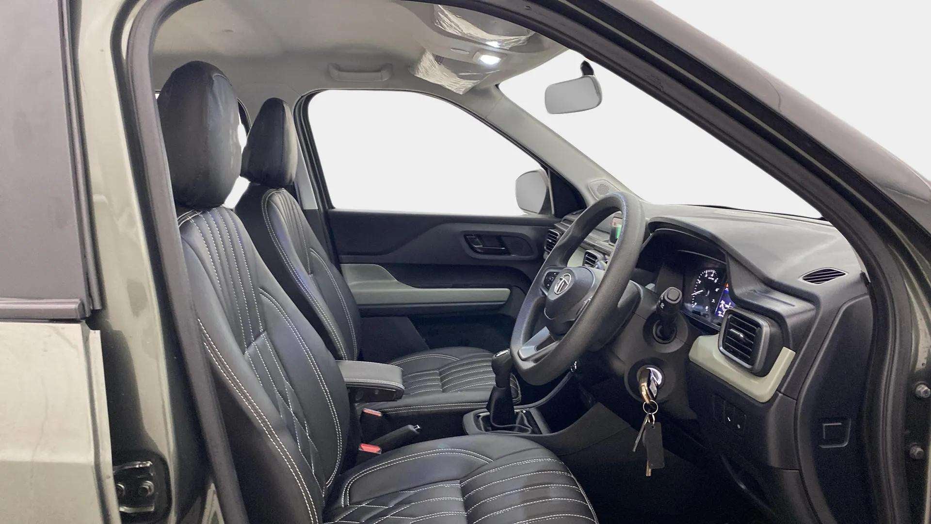 Interior front seats and dashboard of a Tata Punch