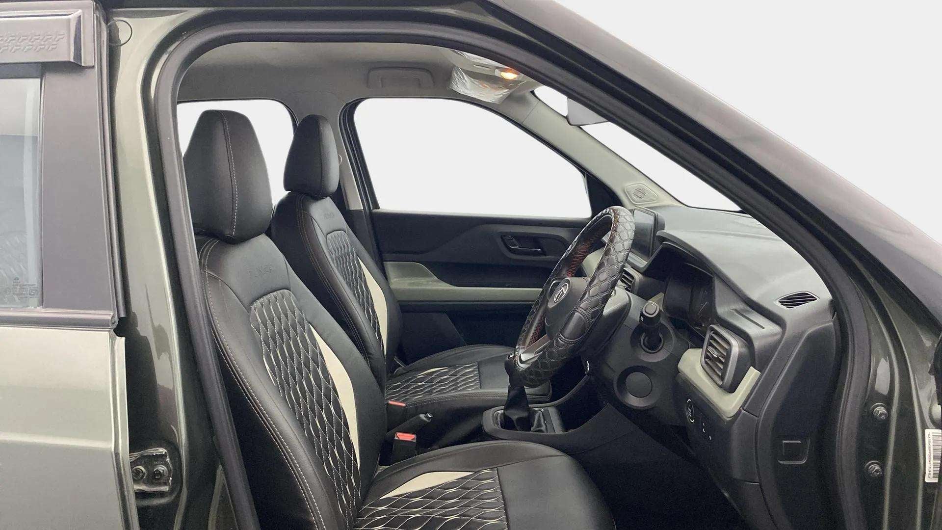 Interior front seats and dashboard of a Tata Punch