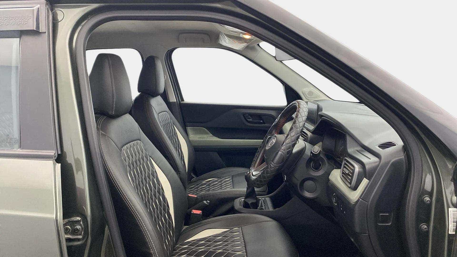 Interior front seats and dashboard of a Tata Punch