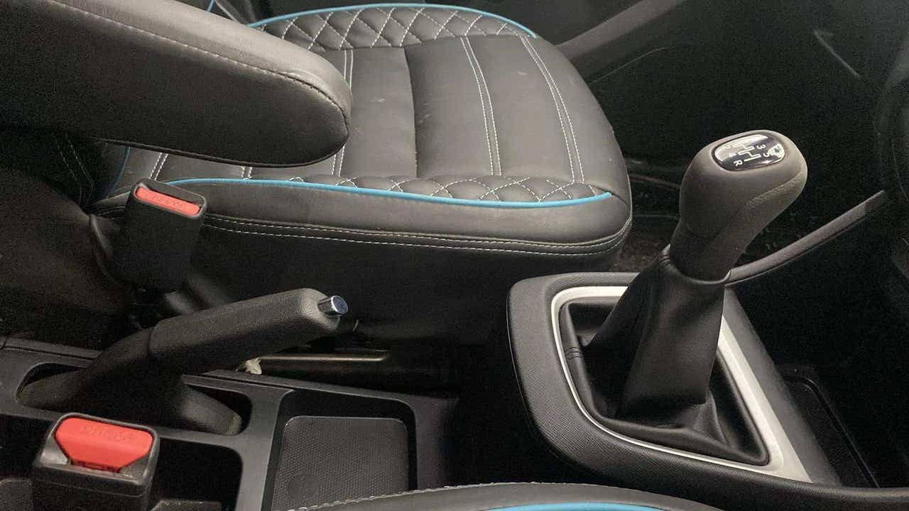 Gear lever and handbrake area of a Tata Punch