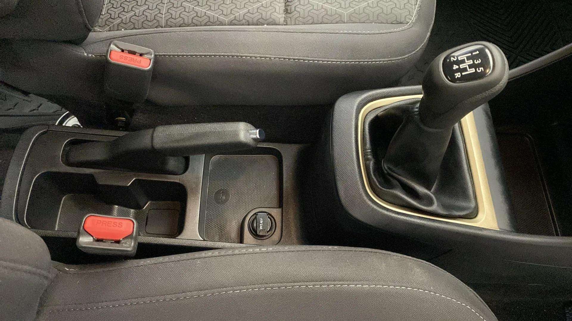 Gear shifter and handbrake view of a Tata Punch