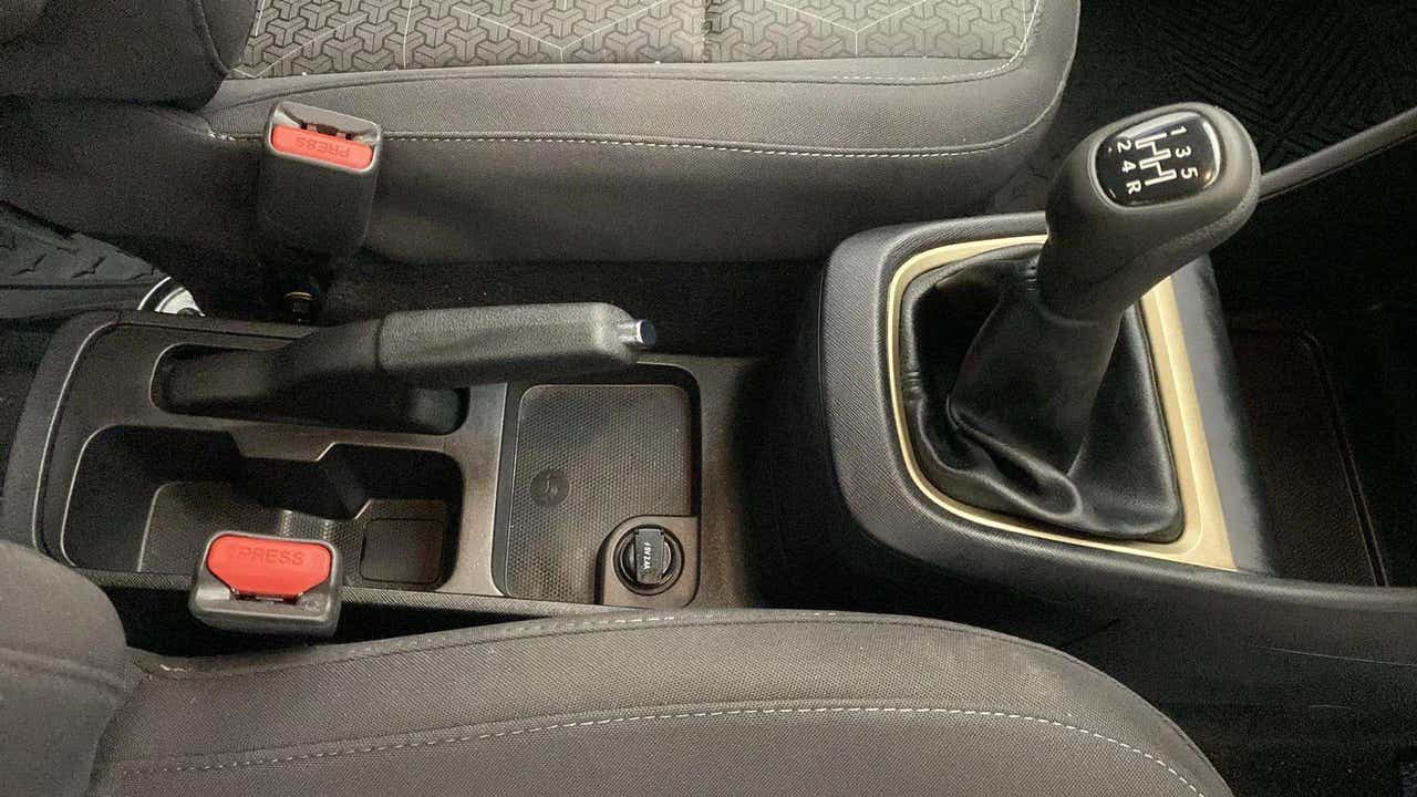 Gear shifter and handbrake view of a Tata Punch