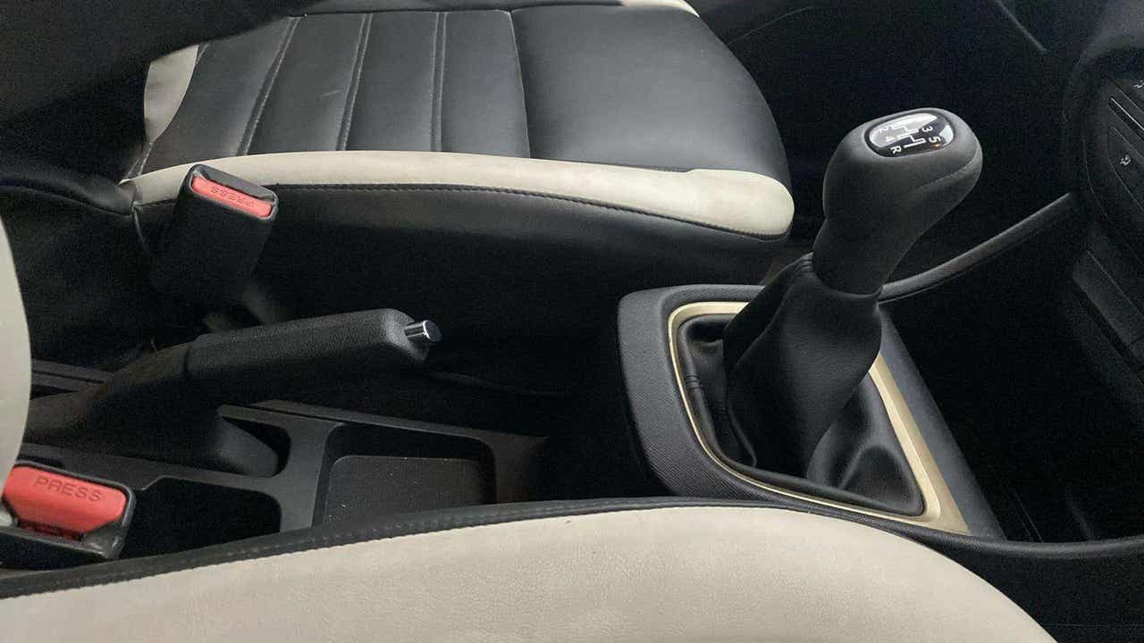 Gear shifter and handbrake view of a Tata Punch