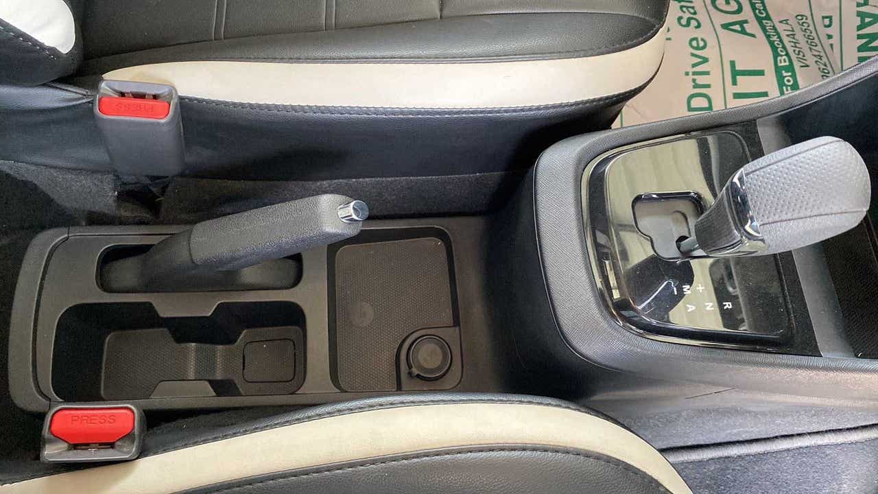 Gear shifter and handbrake area of a Tata Punch