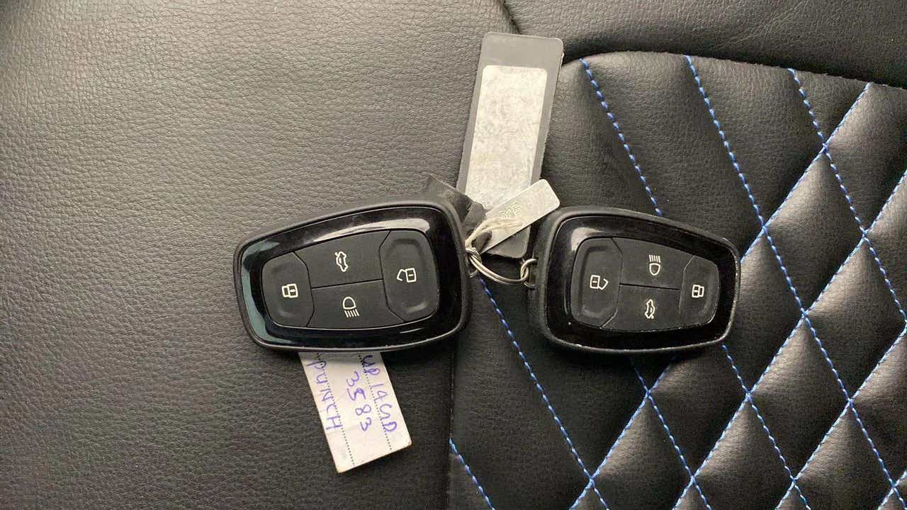 Car key fobs on seat of a Tata Punch