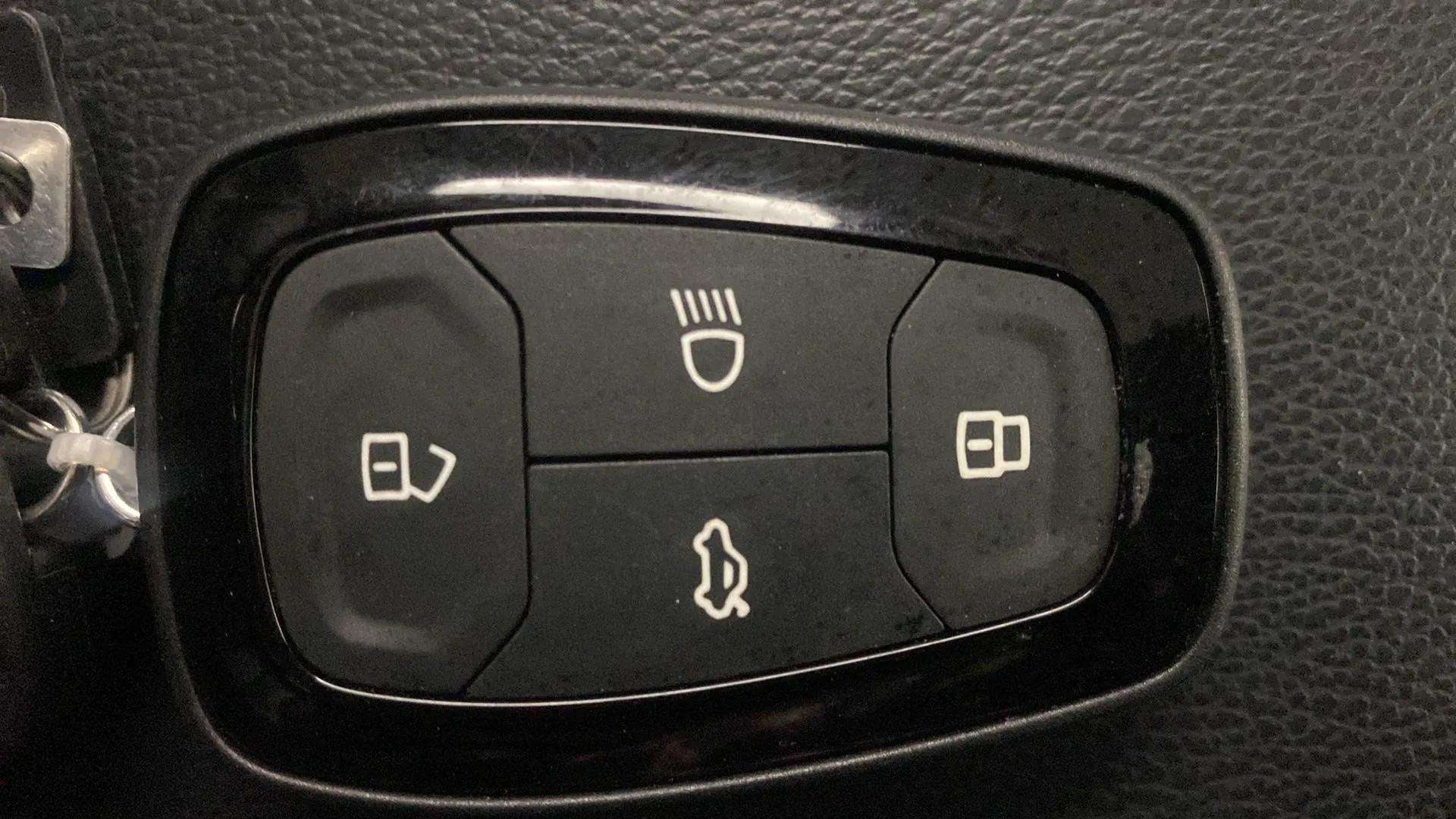 Window and mirror adjustment controls of a Tata Punch