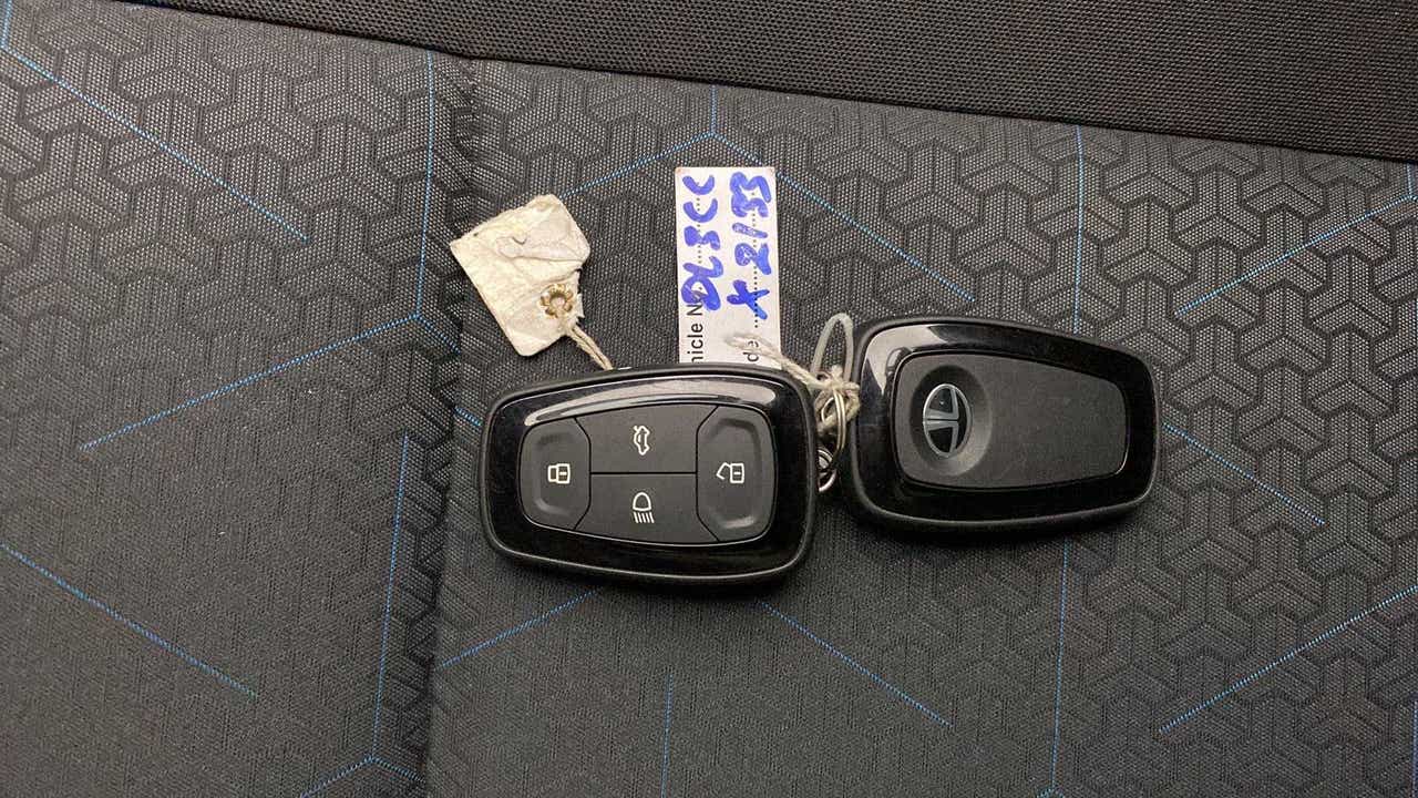 Car key fobs on a seat of a Tata Punch