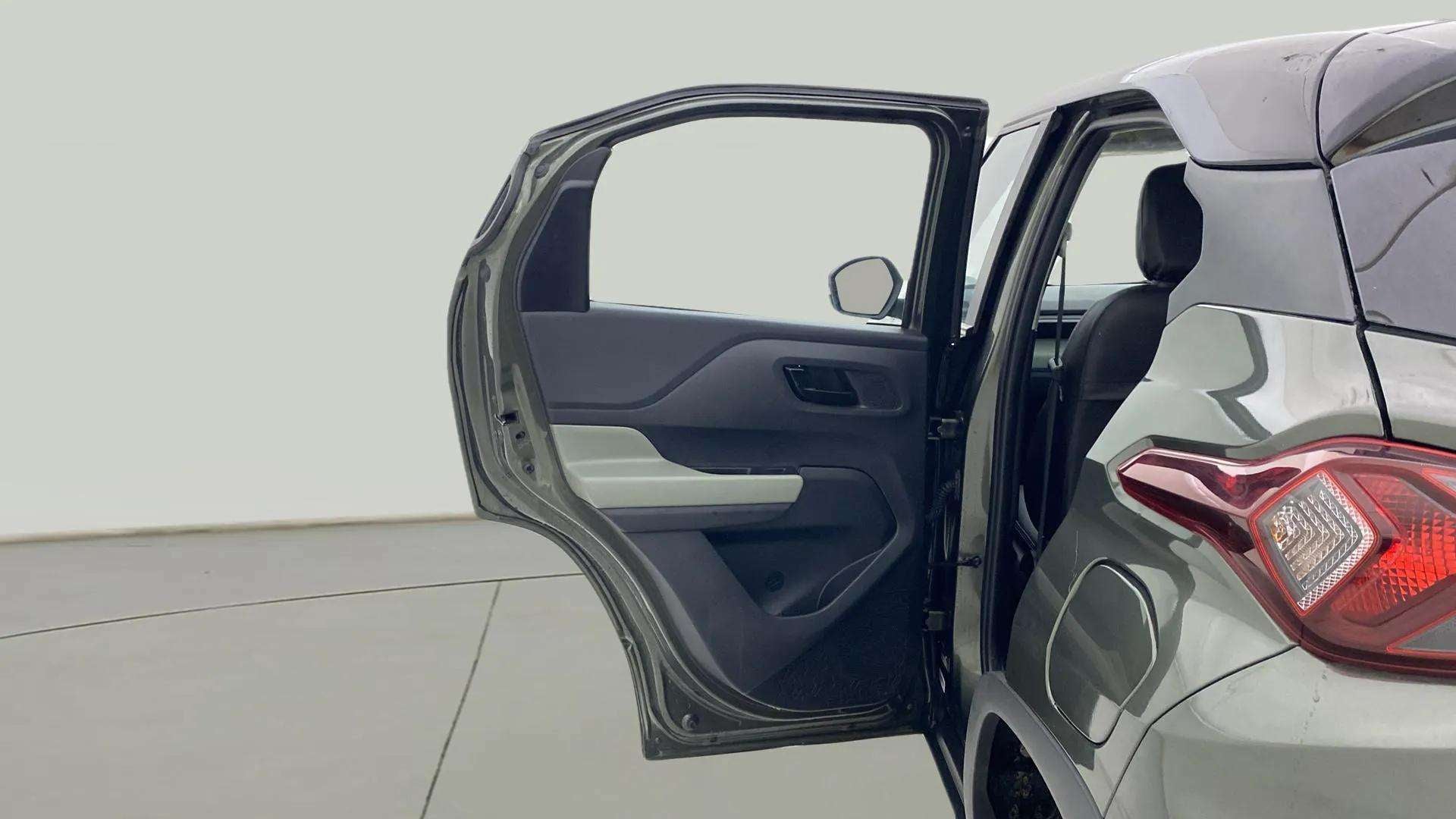 Rear door and taillight view of a Tata Punch