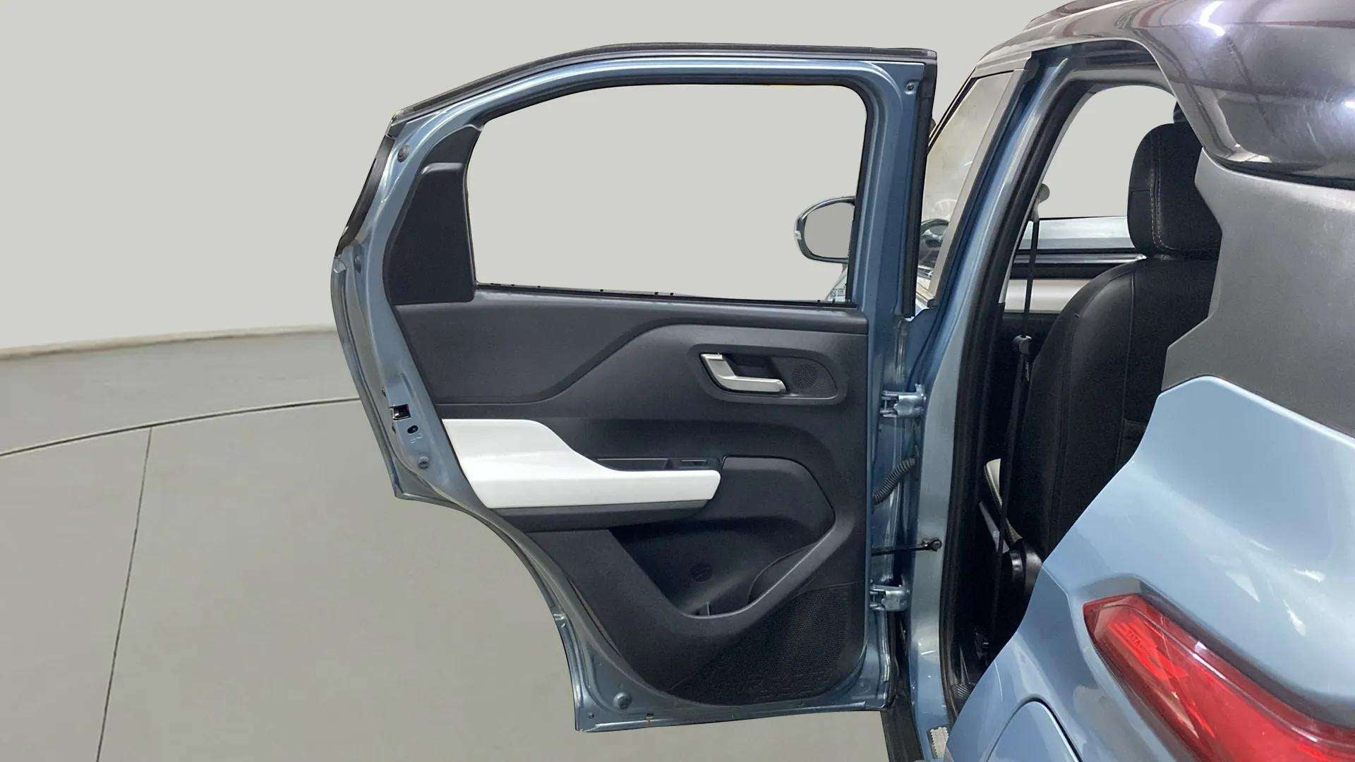 Rear left door interior of a Tata Punch