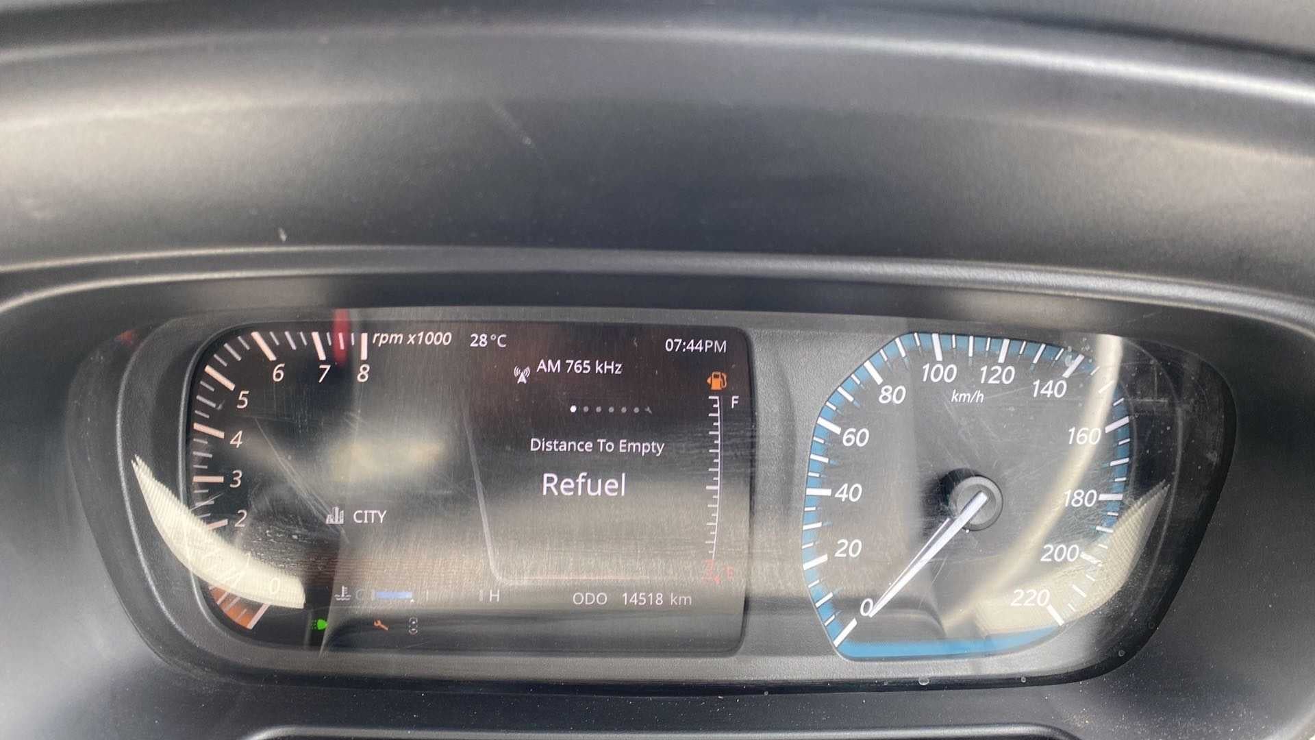 Instrument cluster of a Tata Punch displaying refuel warning
