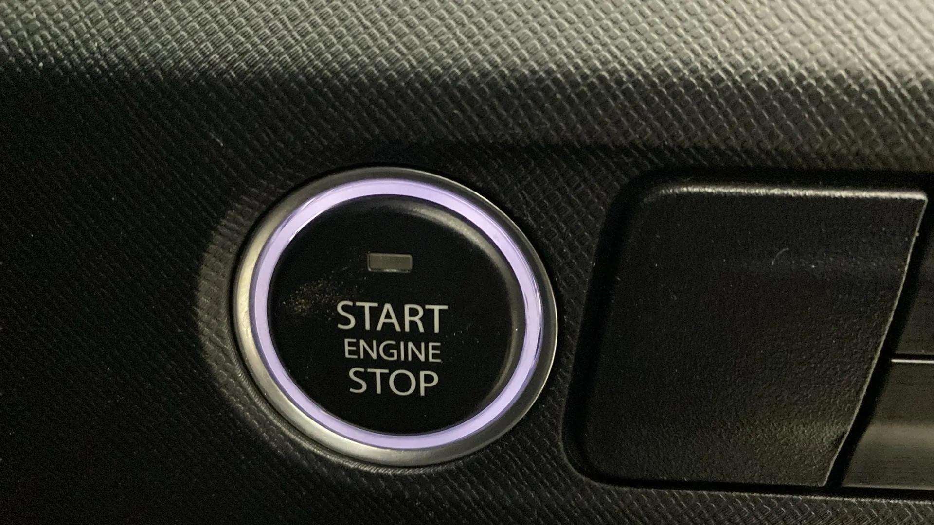 Close-up of the start engine stop button of a Tata Punch