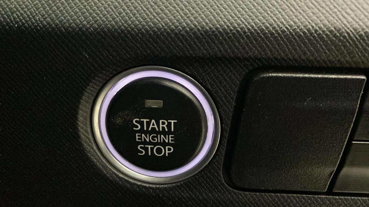 Close-up of the start engine stop button of a Tata Punch