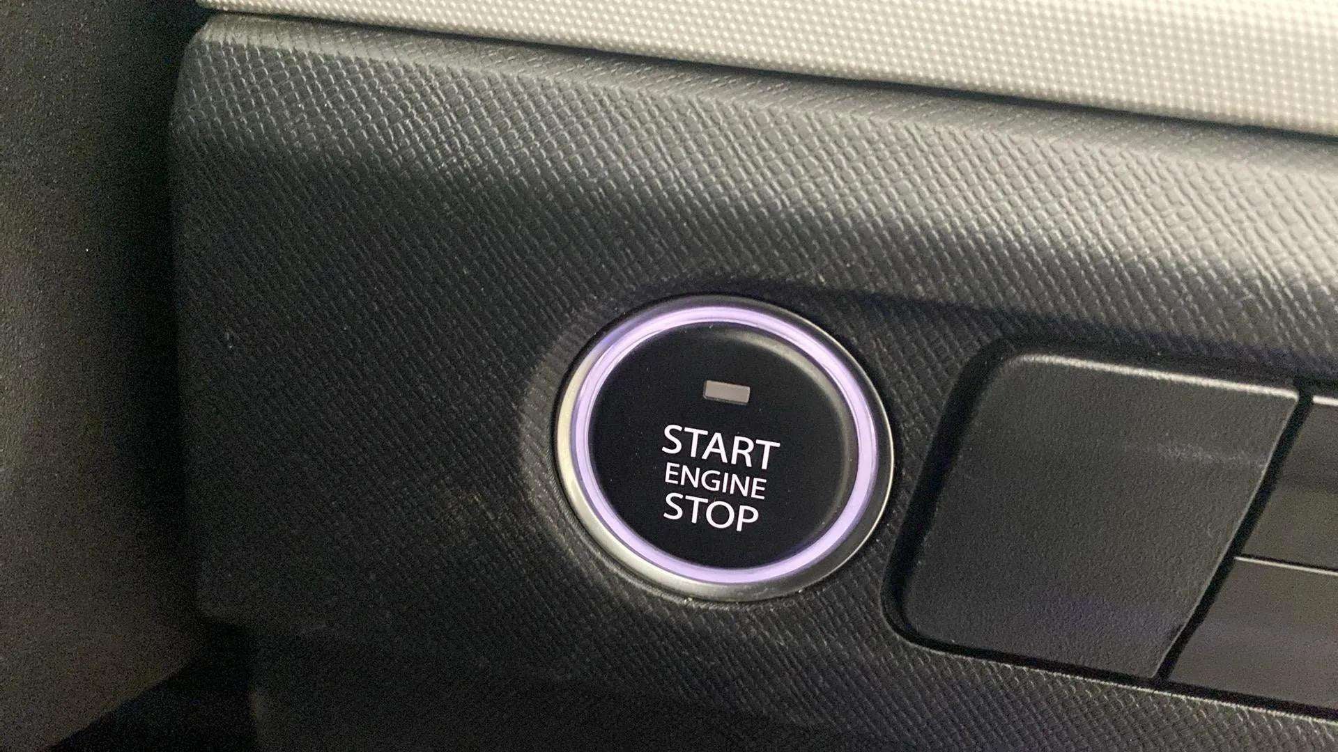 Engine start stop button of a Tata Punch