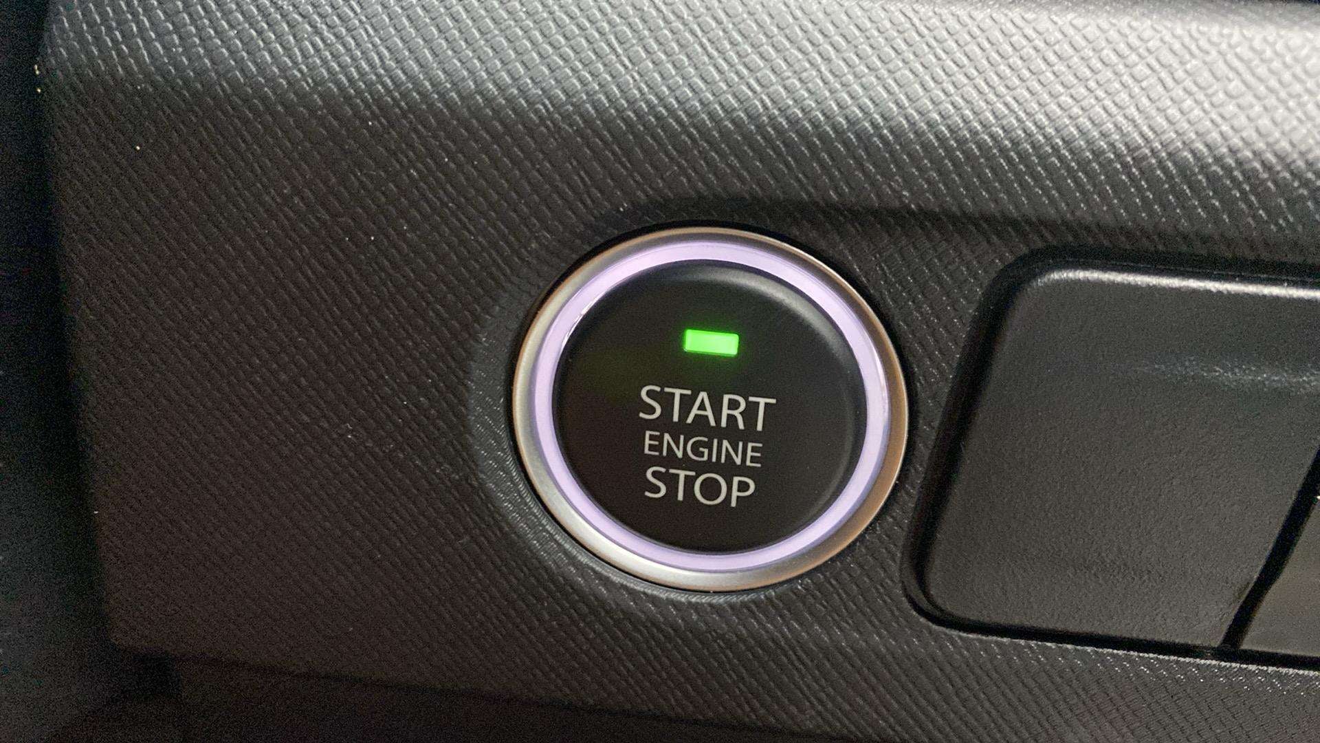 Engine start stop button of a Tata Punch