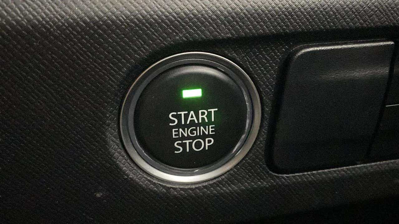 Close-up of the start engine stop button of a Tata Punch
