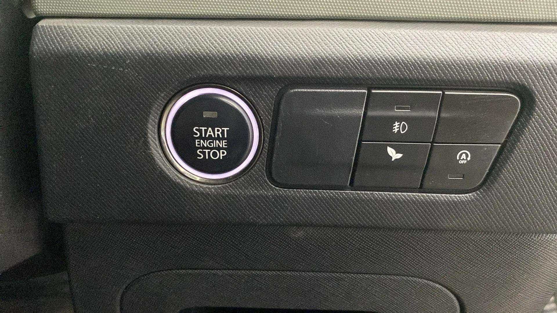 Dashboard controls with start engine stop button of a Tata Punch
