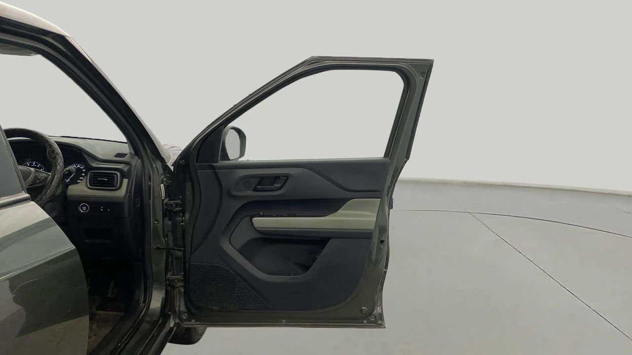 Driver side interior door view of a Tata Punch