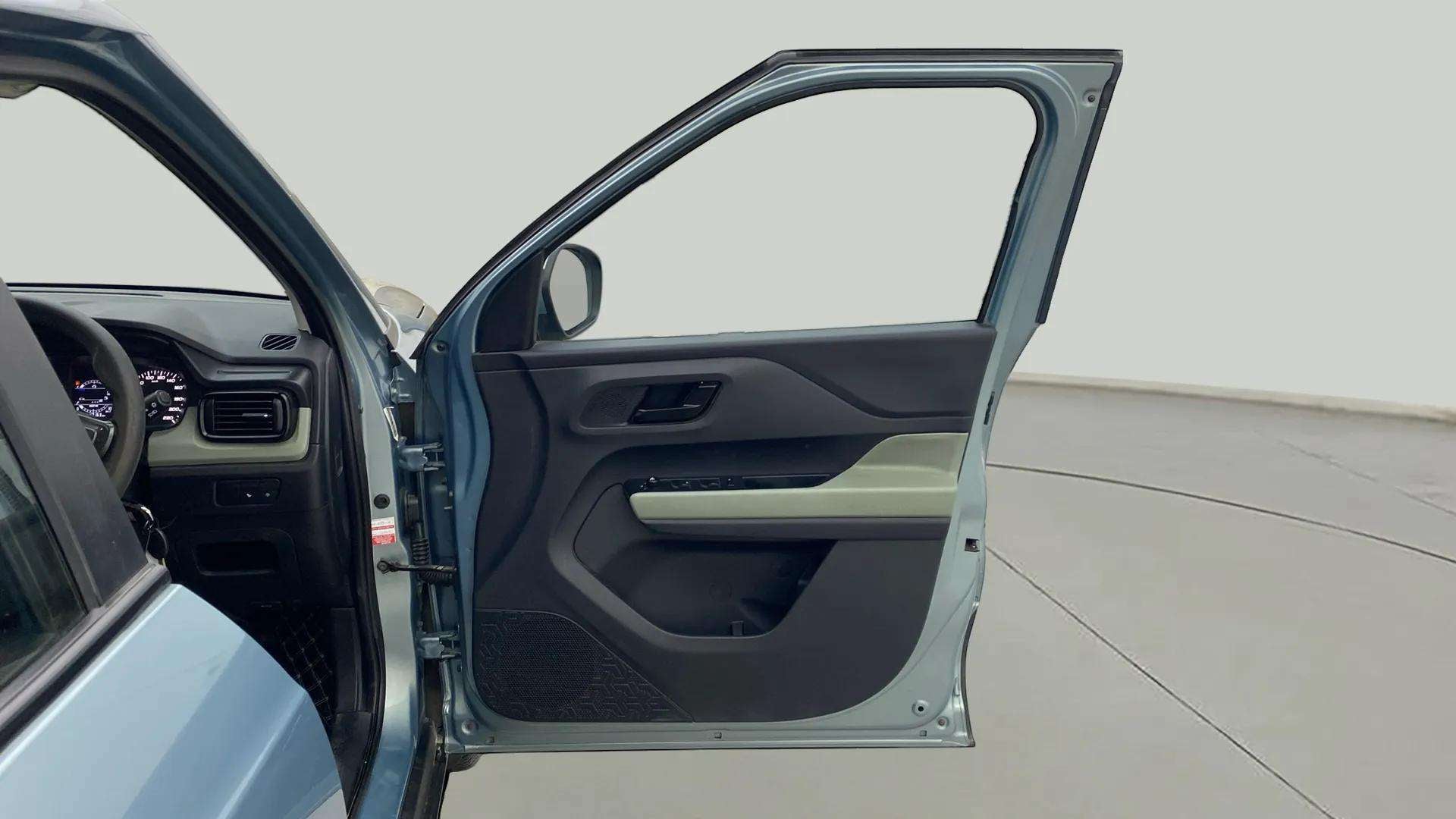 Front driver side door and dashboard of a Tata Punch